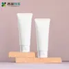 Tubos Suaves Cosméticos en Stock 100g Cuidado de la Piel Limpiador Facial Crema de Manos Loción Tubo Suave Tapa abatible Material de Empaque Tubo Suave Cosmético