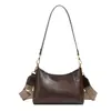 Bolsa de Ombro Vintage Estilo Francês de Nicho para Mulheres 2025 Nova Versátil Retrô Bolsa Baguete para o Dia a Dia Elegante Bolsa de Ombro Único