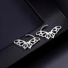 Pendientes de mariposa huecos de plata esterlina s925 con diseño de nicho, pendientes de temperamento único, pendientes de viento frío con hebilla de oreja, venta al por mayor