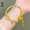 Tienda de Oro Mismo Estilo Pulsera Media con Borla y Diseño de Mariposa y Flor Esmaltadas Chapadas en Oro, Estilo Suave y Elegante, Regalo para Novia