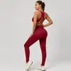 Nuevo Conjunto de Yoga Sin Costuras Europeo y Americano Pantalones de Fitness de Cintura Alta Levanta Glúteos Color Durazno Chaleco Deportivo de Espalda Cruzada de Alta Elasticidad