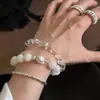 Pulseira de Pérolas Naturais Baroque Floco de Neve Fantasma e Olho de Gato em Prata Esterlina Estilo Coreano Cool e Simples