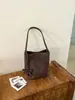 Bolso de hombro cruzado de patrón tejido de nicho para debajo del brazo, bolso de hombro casual vintage para el día a día, bolso tipo cubo versátil moderno y elegante