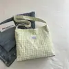 Bolso de mano de nicho estilo coreano 2026, a cuadros con bloques de color estilo ins, dulce y artístico, adecuado para que las chicas lo lleven a clase como bolso de hombro