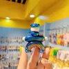 Popular llavero de oso de arcilla de colores electrochapado colgante para pareja femenina llavero colgante de bolsa adornos lindos de dibujos animados exquisitos