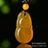 Colgante de ágata amarillo tipo hielo de Guanyin Buda, disponible en estilos unisex, con patrones de nubes auspiciosas y un amuleto Pi Xiu, con varios diseños disponibles para transmisión en vivo y en stock
