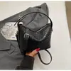 Bolsa de Mão Pequena Trançada Fashion para Mulheres 2026 Nova Bolsa de Ombro Transversal Versátil Vintage de Alto Padrão para o Dia a Dia Tendência