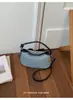 2026 Nueva Bolsa Cápsula de Mezclilla Súper Popular Bolsa de Curling sobre Hielo para Mujer 2026 Nueva Bolso de Mano de Lujo Ligero de Nicho Bolso de Hombro Cruzado