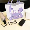 Nova bolsa de lona fofa de coelho, estampa floral, versátil para carregar almoço, adequada para o trajeto para o trabalho, bolsa de lona adorável para estudantes