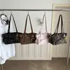Bolsa de bolinhas fresca, doce e fofa, novo modelo 2026, nicho, texturizada, casual, de grande capacidade, bolsa de ombro de alta aparência