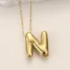 Colgantes de Acero Inoxidable Brillante 26 Letras Inglesas Transfronterizos Europeos y Americanos Collar de Letras Gordas Moderno y Creativo