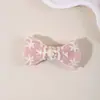 El nuevo accesorio para el cabello transfronterizo de Amazon para niños es un exquisito pasador de lazo para el cabello para niñas, adecuado para flequillos laterales y como adorno para el cabello.