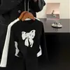 Ropa para Niñas Estilo Coreano Camiseta con Lazo Primavera y Otoño Nueva Versátil de Manga Larga para Niños Bebés Tops para Base de Otoño