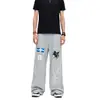 Pantalones deportivos unisex con bordado de unicornio, pantalones de chándal anchos de estilo americano fluidos, pantalones atléticos casuales unisex