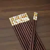 En Stock Kaki Kaki Ruyi Palillos de Madera de Bambú Hogar Palillos Impresos de Imitación de Palo de Rosa Palo de Rosa Palillos de Bambú Antideslizantes Antimoho Estilo Guochao