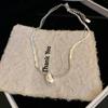 Collar Avanzado de Gotas de Agua Metálicas con Doble Hoja Distintivo Celebridad de Internet Elegante Moderno Sencillo Nicho Collar para Clavícula para Mujeres