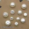 Material para joyería DIY agujero único cara media resaltado perla de imitación cuentas sueltas cuentas de pan al vapor cuentas de pan accesorios