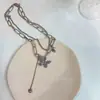 Colar com Pingente Coração Borboleta Empilhado de Camada Dupla Estilo Retrô com Toque de Metal Antigo Personalizado Corrente para Clavícula de Nicho de Celebridade da Internet