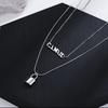 Nuevo collar exquisito de cadena de hueso de serpiente de doble capa para mujer, acero de titanio multicapa, candado pequeño hueco con letra, cadena para clavícula, joyería al por mayor