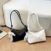 Bolso de hombro moderno, casual, elegante y único con diseño de nicho, nuevo bolso para mujer para la temporada 2026, bolso texturizado para debajo del brazo