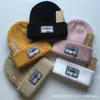 Directo de fábrica sombrero marca de moda moda japonesa sombrero de punto para exteriores cálido a prueba de frío sombrero frío todo partido sombrero de lana etiquetado