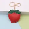 Llavero Colgante de Fruta Melocotón Lindo de Cuero PU de Dibujos Animados Muñeca de Peluche Creativa Encanto para Bolso Venta al por Mayor