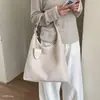 Bolso tote tejido de un solo hombro con textura, casual para el día a día, patrón tejido 2026, sensación de bolsa de gran capacidad, nueva moda para mujer