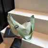 Bolso bandolera de nailon para mujer 2026 nuevo bolso de moda tipo bollo ligero pequeño bolso de hombro bolso de axila bolso de hombro único de lona