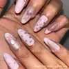 Uñas postizas estilo europeo francés ojo de gato con puntas de uña de lazo forma de almendra manicuras terminadas