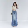 Jeans juveniles acampanados de tiro bajo con estampado de bambú en color naranja para mujer, corte holgado, adelgazantes, con caída, casuales, versátiles, pantalones de largo hasta el suelo