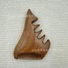 Peine de masaje de sándalo dorado con forma de delfín, peine de madera de caballito de mar, fabricantes de peines de madera al por mayor, peine meridian en stock, peine de masaje de madera engrosado