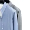 Camisa de algodón de alta gama para hombre para otoño, simple y casual, top versátil de manga larga, estilo casual ligero y maduro