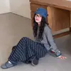 Pantalones de cuadros de pierna ancha para niñas, pantalones a cuadros retro versátiles casuales para niños mayores, pantalones de moda sueltos estilo coreano para primavera y otoño