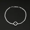Nuevo Pulsera de Broche de Cuatro Hojas Redondo Completamente Diamantado Micro Pavé de Circonita Cadena de Tenis Diseño de Nicho