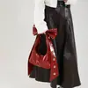 Bolso de Hombro Individual Estilo Dulce y Fresco de Gama Alta para Mujer 2025 Nueva Moda Bolso Personalizado con Remaches Bolso de Celebridad de Internet con Lazo Bajo el Brazo