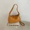 Bolsa Nueva para Mujer Primavera/Verano 2026 Bolso de Hombro Único Bolso de Mano Remachado Comercio Exterior Transfronterizo Viaje al Trabajo Bolso Almohada