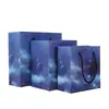 Em estoque saco de papel céu estrelado criativo bolsa de mão requintada estilo ins saco de presente azul simples saco de presente para roupas