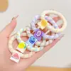 Nueva Banda Elástica Acanalada Suave Engrosada de Color Helado con Pequeña Etiqueta de Tela Floral Versátil Goma para el Cabello Cuerda para el Cabello Anillo para el Cabello