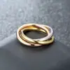Anel tricíclico de venda quente da Amazon, anel de casal de aço de titânio, anel de diamante giratório antiansiedade, joias de mão transfronteiriças