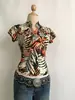 Nueva Camiseta de Mujer Estilo Chino Retro Primavera/Verano 2026 Manga Corta Mejorada Estampado de Plantas Tropicales Cuello Alto