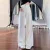 Jeans feminino de perna larga, nova coleção primavera/outono 2026, cintura alta, caimento solto, emagrecedor, versátil, com caimento fluido e design de perna reta, comprimento até o chão