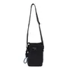 Bolso pequeño cuadrado casual y versátil estilo coreano, nueva colección otoño 2026, bolso pequeño cuadrado de nailon a la moda, bolso cruzado de alta gama y moderno