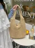 Versión Coreana 2025 Nuevo Bolso Tejido para Vacaciones Bolso de Hombro Tote para Mujer Estilo Perezoso Flor Hueca Tejida Bolso de Playa