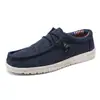 Mocasines de hombre talla grande transfronterizos, zapatos casuales de moda coreana modernos para hombre, zapatos de lona slip-on transpirables y ligeros
