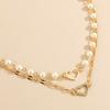 Europa y Estados Unidos joyería caliente transfronteriza temperamento perla cadena clavícula simple hueco amor colgante collar traje multicapa mujeres