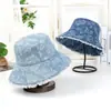 Sombrero de pescador de mezclilla bordado floral para mujer de primavera y verano, lavado, protección solar, estilo callejero casual, con bordes deshilachados