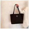 Bolsa de Lona Nueva para Viajeros Coreana al por Mayor Transfronteriza Simple Casual Color Sólido Bolsa Tote Gran Capacidad Moda Bolso de Hombro