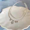 Collar de perlas con estrella de cuentas estilo francés, lujo ligero, alta moda, cadena exquisita para suéter, diseño único, accesorio de nicho para mujer