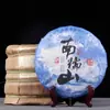 Té al por mayor 2018 té Pu'er de material puro de árbol antiguo de Nannuoshan pastel de té crudo pastel de té de siete semillas de Yunnan 357g