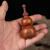 Colgante de Madera Tallada con una Calabaza en Forma de Espada, Madera de Azufaifo Golpeada por el Rayo y Motivos de Flores Púrpuras, Presentando un Maestro Celestial y un Dios del Trueno, Adecuado para Sostener y Jugar